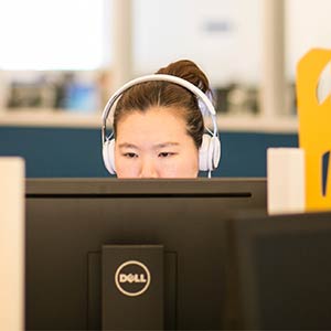 Student sitting in a computer lab