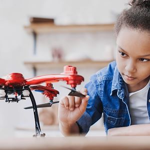 Girl with a red drone