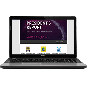 Open laptop with President's Report on screen