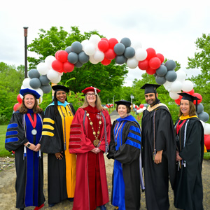 The Senior Leardership and Cabinet in graduation gowns during the 2023 commencement ceremony