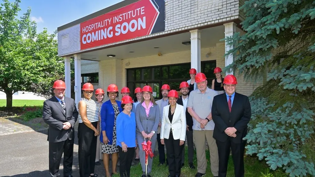 a group of people standing in front of a building