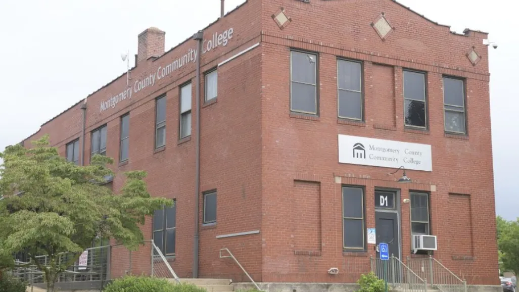 an old brick building with a clock tower