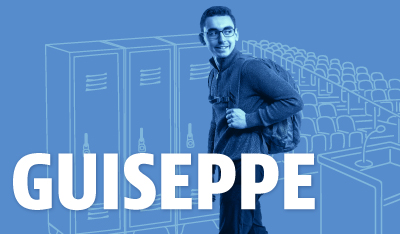 Guiseppe posed in front of graphics of school lockers and theater seating