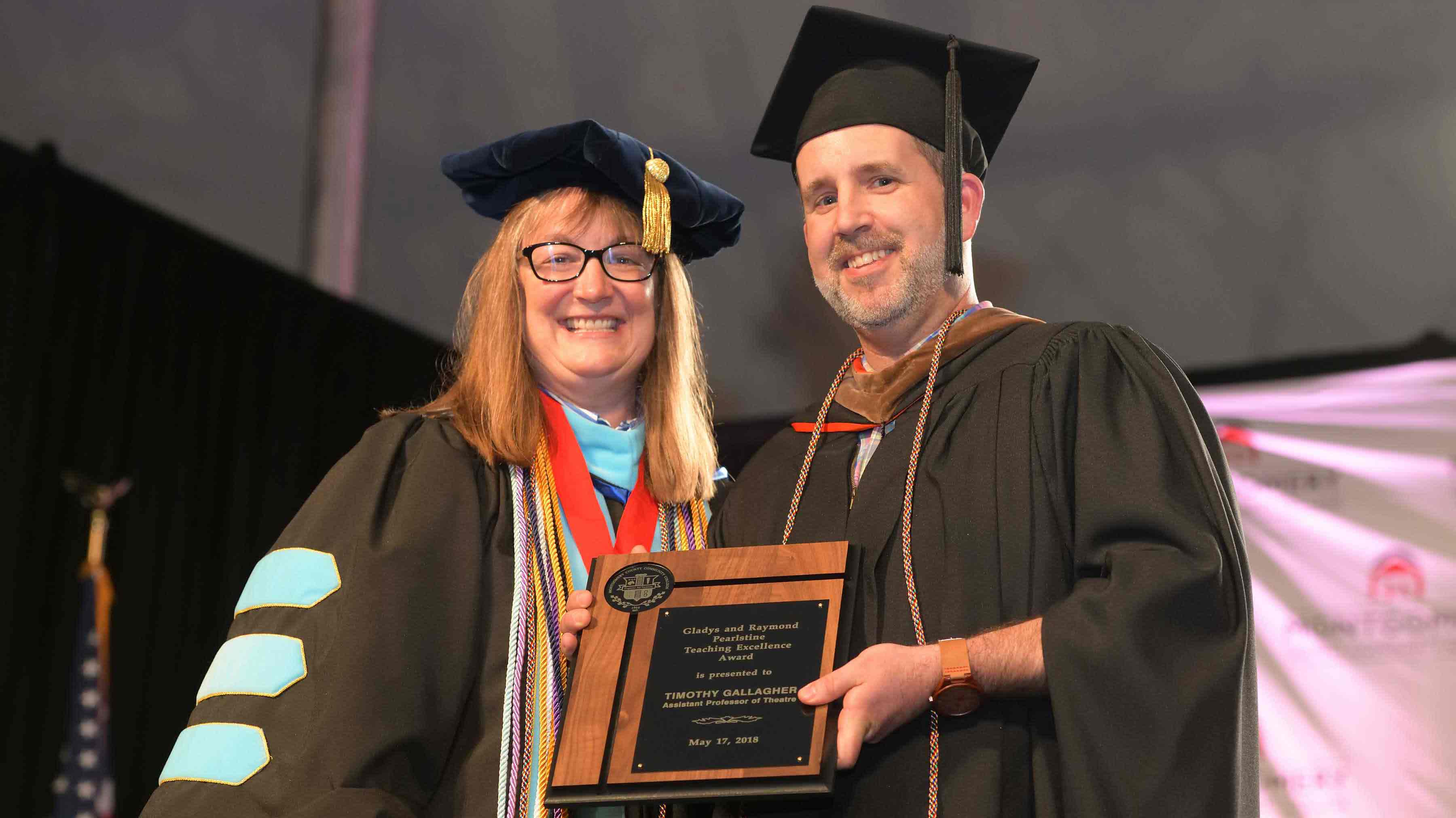 Assistant Professor of Theatre Arts Tim Gallagher received the 2018 Pearlstine Excellence in Teaching Award from Vice President of Academic Affairs and Provost Victoria Bastecki-Perez. Photo by David DeBalko