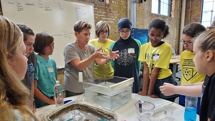 Connie Nye, an environmental educator, author and founder of Sweet Water Education Events Training, teaches the students about aquatic life.