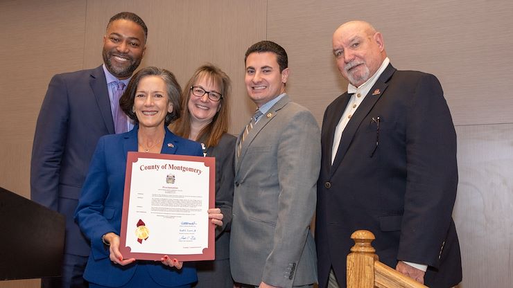 Montgomery County Commissioners present a proclamation honoring MCCC's 55th anniversary and Founders' Day.