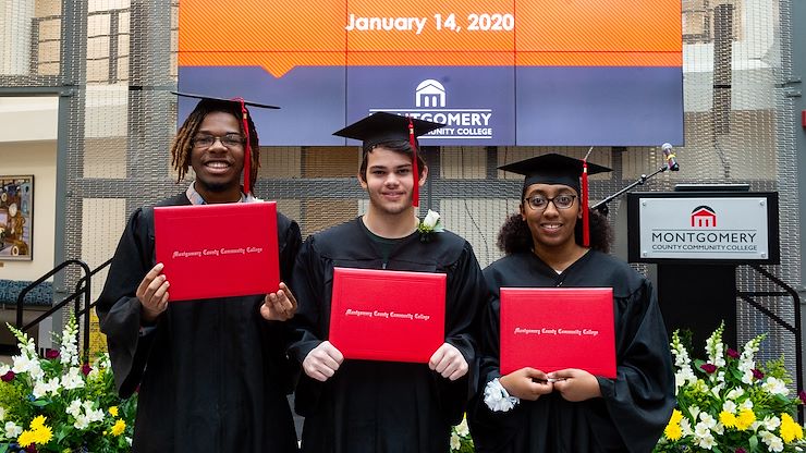 Three students (from left), Solomon Wilson, Max Biagini and Nya Zenquis, recently received their high school diplomas through Montgomery County Community College’s Gateway to College Program, which enables students to stay on track to finish their high school requirements. Photo by Susan Angstadt