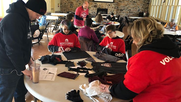 Montgomery County Community College students, employees and family members volunteered to make pet toys for the SPCA at the Elmwood Park Zoo in Norristown. Photo by Matthew Moorhead