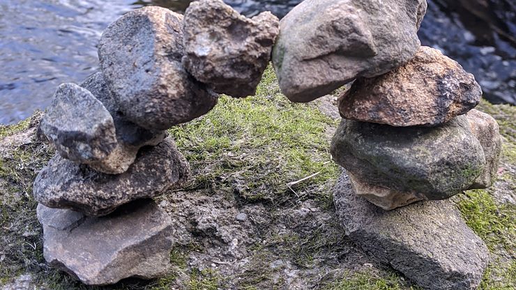 After studying the work of world-renowned artist, Andy Goldsworthy, Jared Albany created this beautiful rock arch along a creek near his home.