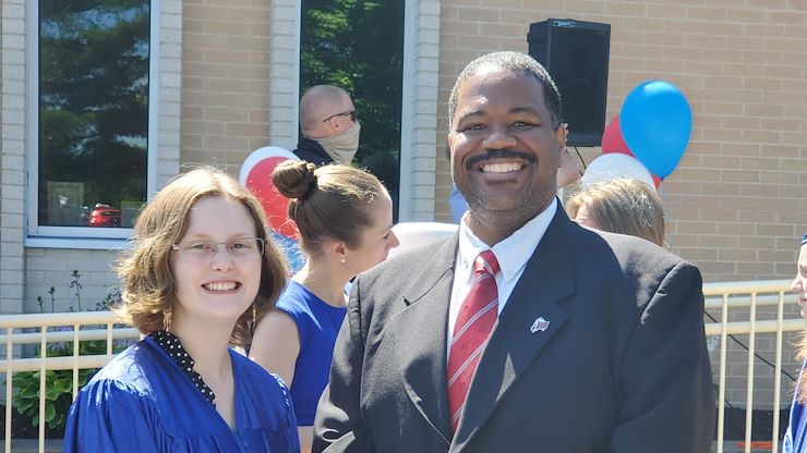 Dr. Samuel Coleman, Assistant Dean of Student Affairs, stands with Emily Alexis Harris, a recent graduate of The Anderson School, and recipient of The Montgomery County Community College Full Tuition Scholarship.