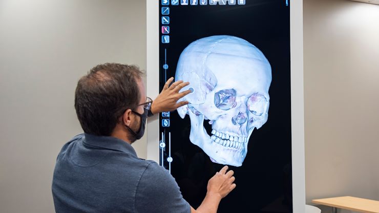 Matthew Kilbride, Instructional Technology Simulation Specialist, gives a demonstration of the new Anatomage Tables now available at Blue Bell and Pottstown Campuses. The machines offer a new way for health science students to study anatomy and physiology. Photo by Linda Johnson.