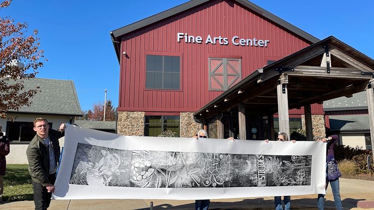 Artists, students and community members participate in an art workshop at Montgomery County Community College's Fine Arts Center featuring steamroller printing, printmaking and pumpkin carving. Photo by Susan Angstadt