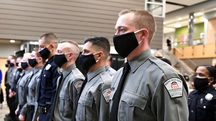 After successfully completing 919 hours of instruction over 24 weeks, 23 police cadets graduated from Montgomery County Community College's Municipal Police Academy on Dec. 14. Photo by Susan Angstadt