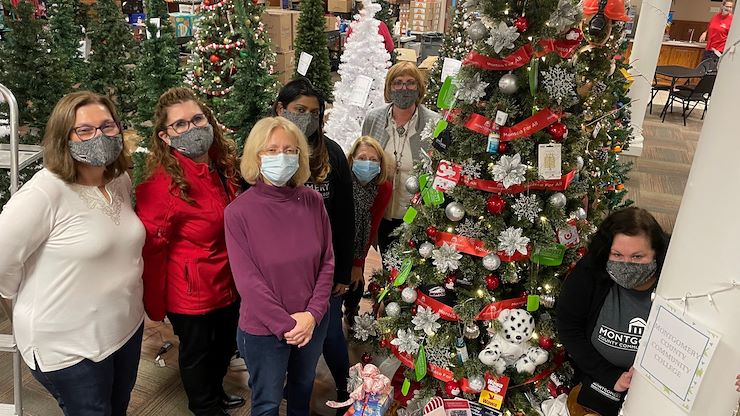 Montgomery County Community College celebrates the 25th anniversary of its Pottstown Campus with a special Montco for All tree that is part of the Boyertown Area Multi-Service Inc.'s Festival of Trees annual fundraiser. Tree committee members, from left, Maria Pettine, Christine Morris, Connie Rothermel, Anjuli Aker, Diane VanDyke, Amy Auwaerter and Cindy Whitley.