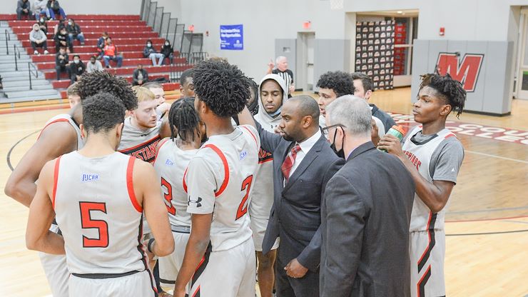 The Mustangs Men's Basketball Team has been ranked first in its division and is on an undefeated 13-game winning streak. Photo by Gene Walsh, Fifth Street Photos.