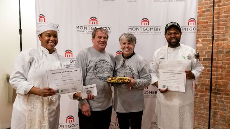 Sheila and Gene Dugan (center), owners of Grumpy's Handcarved Sandwiches in Pottstown, congratulate the winners of the 2022 Sandwich Challenge, Ayanna Marville (left) and Kyle Edmonds (right), Montgomery County Community College Culinary Arts Students. Photo by Susan Angstadt