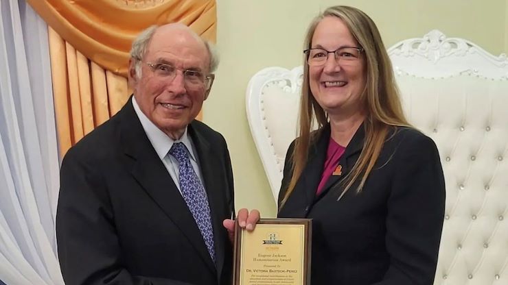 Dr. Bernard Dishler, HealthLink Dental Clinic's Immediate Past President of the Board of Directors, presents the Eugene Jackson Humanitarian Award to Dr. Vicki Bastecki-Perez, Montgomery County Community College's President. Photo courtesy of HealthLink Dental Clinic