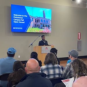 A speaker at fall open house at Pottstown Campus