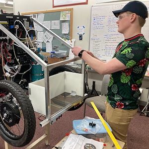 Nathan Mayer works on Innova