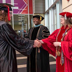 congratulating graduate