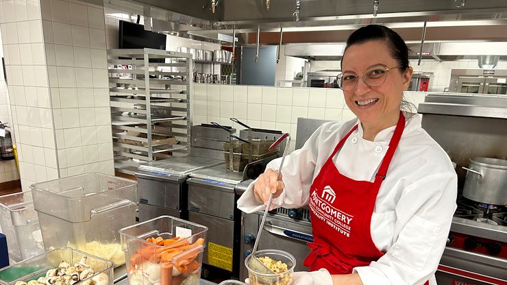 Food Sustainability Fellow in the Hospitality Institute Jennifer Fanega prepares healthy meals for the Stock Up for Success Food Pantry on Blue Bell Campus using excess foods from the Culinary Arts Program. Photos by Eric Devlin