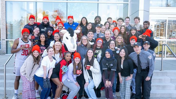 Dr. Victoria L. Bastecki-Perez, Montgomery County Community College President, stands with students on the steps of College Hall on Blue Bell Campus. MCCC is celebrating its 60th anniversary. Photo by Talia McLeod.