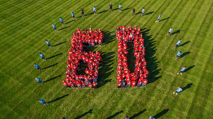 More than 350 students, employees, alumni and community members at Montgomery County Community College assembled at Blue Bell Campus to form a ‘Human 60’ to commemorate the College’s 60th anniversary. Photo by Nick Savino /NGS Productions