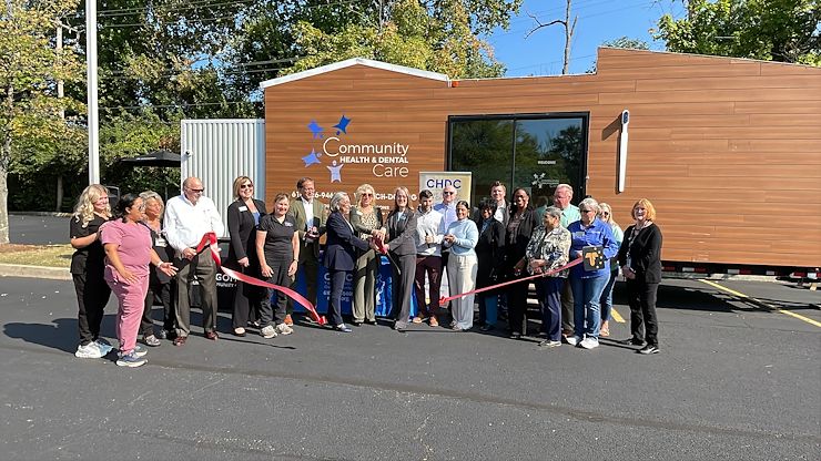 Officials from Community Health & Dental Care, Montgomery County Community College and the TriCounty Area Chamber of Commerce along with students, employees and community members celebrated the grand opening of the CHDC Mobile Oral Health Unit on MCCC's Pottstown Campus. Photo by Diane VanDyke