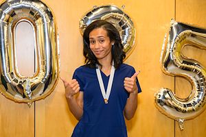 nurse giving thumbs up