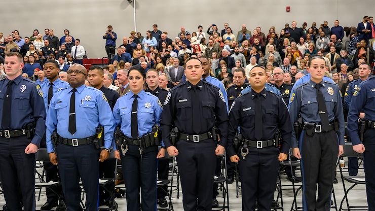 Graduating Montgomery County Community College Municipal Police Academy cadets stand at attention during the program’s Dec. 10 graduation ceremony. Thirty-seven new officers completed the program. Photo by Linda Johnson