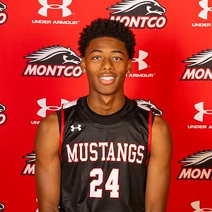 Tariq Jennings portrait in front of a red Montco background