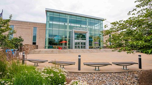 Exterior view of the entrance to College Hall on the Blue Bell Campus of Montgomery County Community College during spring. 