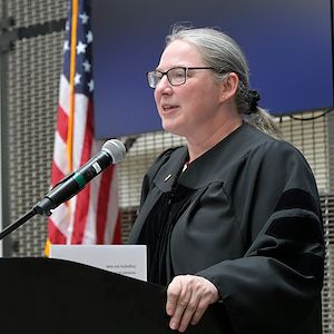 Dr. Cathy Hoult Shewring speaks during a Phi Theta Kappa induction ceremony