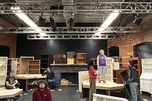 Peyton Seitzinger, Harris Betz, Alex Voss, Patrick Kovach, Nayla Garcia, Autumn Sherry, Star Gies, Chrissy McGuinness, and Juleon Gibson rehearse a scene from “The Library at the End of the World.”