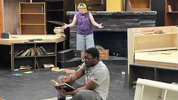 Autumn Sherry (left) and Juleon Gibson rehearse a scene from “The Library at the End of the World” in the Pottstown Theatre in North Hall of Montgomery County Community College’s Pottstown Campus. Performances run April 23-26. Photo by Tim Gallagher