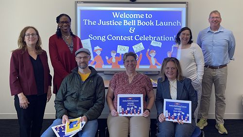 From left: Amanda Owen, Dr. Chae Sweet, Brian Hopely, Jen Gordon, Dana Miller, Nicole Miron Maugle and Lawrence Greene at the 2026 Justice Bell Song Contest award ceremony.