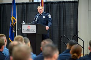 Cadet Derek Smith gives the valedictory remarks during the Municipal Police Academy graduation ceremony.