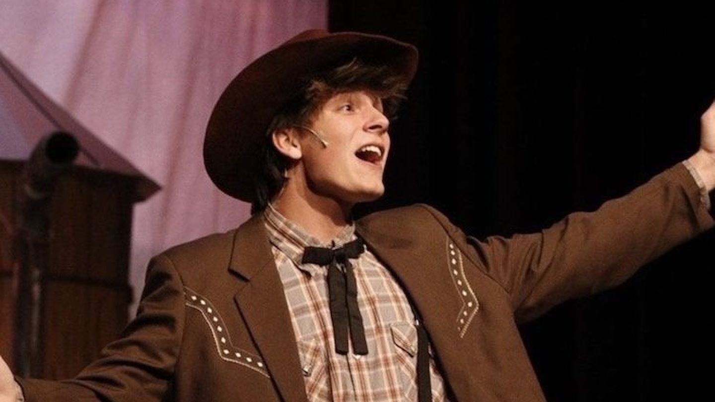 Jared in high school play