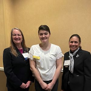 Taylor Bellegue with MCCC President Victoria L. Bastecki-Perez and Board of Trustees Chair Varsovia Fernandez